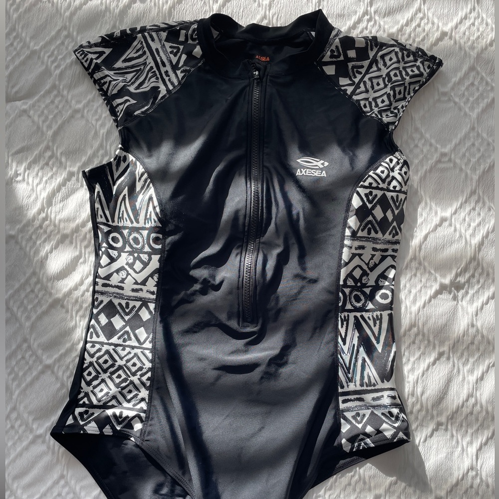 Modest woman’s swimsuit black and white sleeves